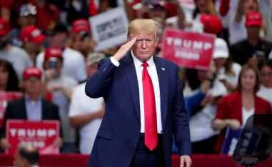 US President Donald Trump gestures during a "Keep America Great" Campaign Rally at American Airlines Center on October 17, 2019 in Dallas, Texas