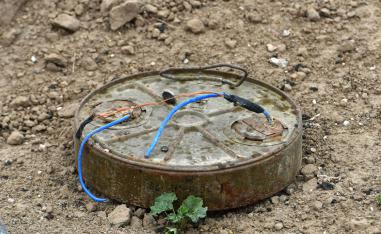 Discarded landmine lying on the ground in the village of Baghouz in Syria's eastern Deir Ezzor province