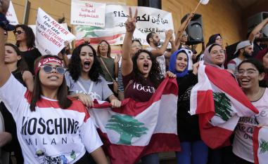 Anti-government protesters shout slogans against the Lebanese government in Beirut