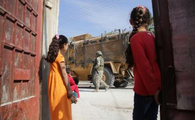 Turkish soldiers patrol the northern Syrian town of Tal Abyad on the border between Syria and Turkey