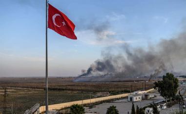 Smoke rises from the Syrian town of Tal Abyad