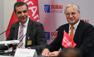 Adel Ali (L), CEO of Air Arabia, and Christian Scherer, Chief Commercial Officer (CCO) at Airbus at Dubai Airshow