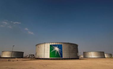 Branded oil tanks at Saudi Aramco oil facility in Abqaiq, Saudi Arabia