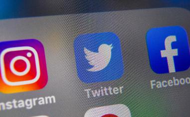Logos of US social networking websites Instagram, Twitter and Facebook