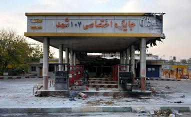 A scorched gas station that was set ablaze by protesters during a demonstration against a rise in gasoline prices in Eslamshahr
