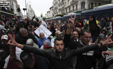 Demonstrators take to the streets in the capital Algiers to protest against the government