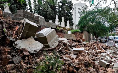 Graves damaged during bad weather in a winter storm at the Jewish cemetery in the Lebanese capital Beirut