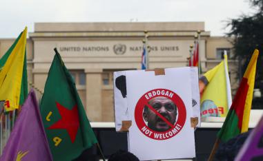 A placard depicting Turkey's President Recep Tayyip Erdogan is seen during a Kurds' demonstration in Geneva