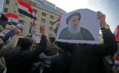 Iraqi supporters of Iran-backed Hashed Al-shaabi armed network protest in Baghdad's Tahrir Square
