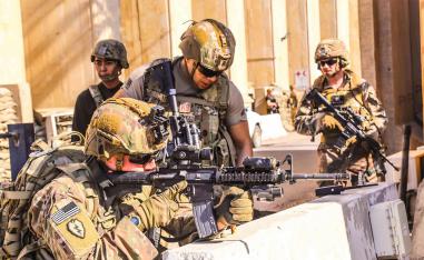 US soldiers taking position around the embassy in the capital Baghdad