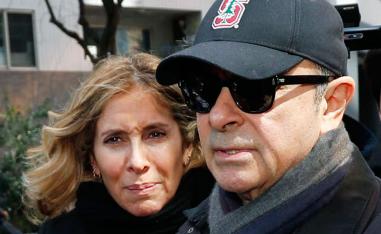 Former Nissan Chairman Carlos Ghosn, right, and his wife Carole in Tokyo