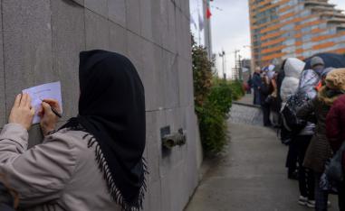 People wait in line to submit their petitions opposing a massive canal project at Atasehir, in Istanbul