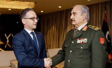 German Foreign Minister Heiko Maas shakes hands with Libya's commander Khalifa Haftar in Benghazi