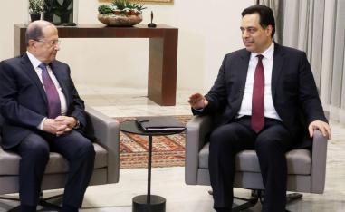 Designated Prime Minister Hassan Diab meets with Lebanon's President Michel Aoun at the presidential palace in Baabda