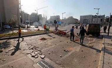 Lebanese anti-government protesters set up a roadblock in the downtown area of the capital Beirut