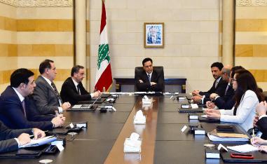 Lebanese Prime Minister Hassan Diab (C) meets a delegation from the International Monetary Fund (IMF) in Beirut