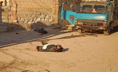  Two bodies following a reported barrel bomb attack by Syrian government forces on the village of Kafr Nuran in the northern province of Aleppo