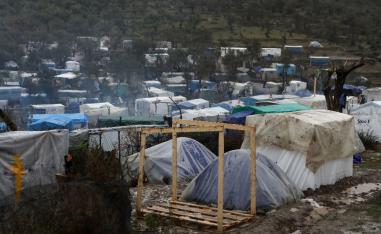 A view of temporary camp for refugees and migrants next to the Moria camp during heavy rainfall on the island of Lesbos