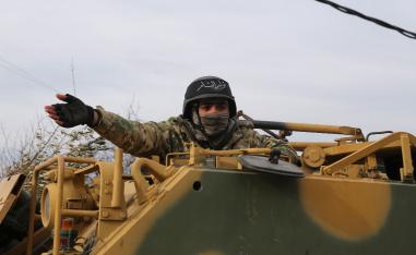A Turkish backed Syrian fighter preparing to go to the frontline in Idlib province