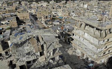 an aerial view of the town of Sarmin, about 8 kilometres southeast of the city of Idlib