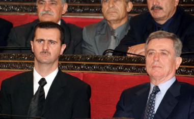 Syrian President Bashar al-Assad (L) and former Vice President Abdul-Halim Khaddam