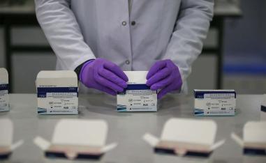 A research and development company worker works on the production of coronavirus testing kits in Gebze, northwestern Turkey