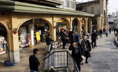 People view items for sale outside the Tajrish Bazaar in Iran's capital Tehran