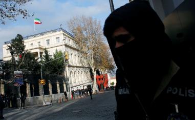 A Turkish police officer stands guard in front of the Iranian Consulate in Istanbul