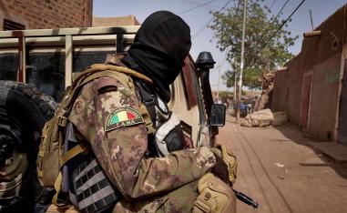A soldier of the Malian army is seen during a patrol on the road between Mopti and Djenne, in central Mali