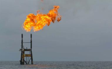 Flames rise from a Total Elf Fina offshore oil rig off the Angolan coast.