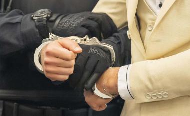 Handcuffed defendant