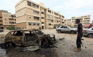 Destroyed car following bombardment in Tripoli