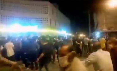 People protesting over economic hardship on the streets of Behbahan