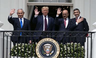 Israeli Prime Minister Benjamin Netanyahu, left, President Donald Trump, Bahrain Foreign Minister Khalid bin Ahmed Al Khalifa and United Arab Emirates Foreign Minister Abdullah bin Zayed al-Nahyan react on the Blue Room Balcony after signing the Abraham Accords 