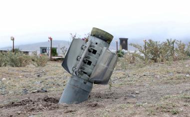 he remains of a rocket shell are seen near a graveyard in the town of Ivanyan (Khojaly) in the breakaway region of Nagorno-Karabakh