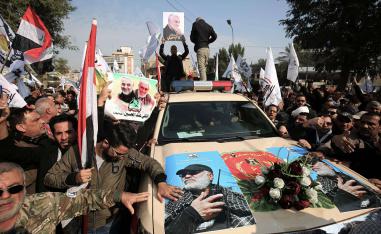 مظاهرة لأنصار الحشد الشعبي ببغداد في الذكرى الأولى لوفاة سليماني والمهندس