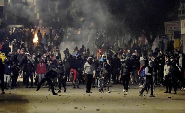 Up to 300 young men clashed with police in Tunisian capital's Ettadamon district