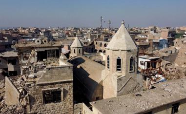 A view of the old city of Mosul and buildings destroyed during past fighting with Islamic State militants