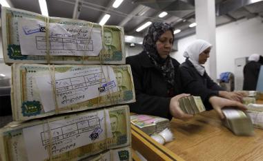 50,000 Syrian pounds, which is nearly $11 on the black market, will go to public sector workers