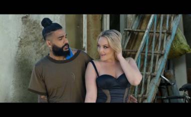 Sasy's video features actresses, including an American porn star, gyrating in kimonos and short bodycon dresses atop cars and inside bars