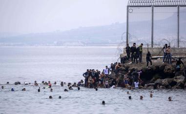 Around 8,000 migrants, many from Sub-Saharan Africa and including 1,500 minors, entered Ceuta