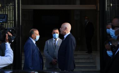 الرئيس التونسي قيس سعيد ووزير الداخلية رضا الغرسلاوي