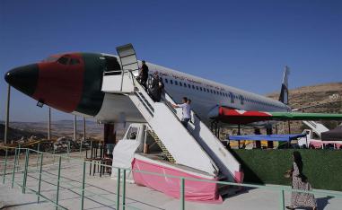 Many visitors come to take photos inside the plane at a price of five shekels (about $1.50) per person