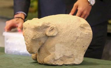 A Sumerian ram's head is displayed
