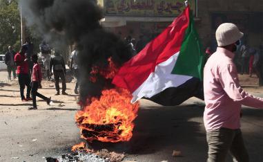 Protesters brave tear gas to demonstrate against military rule 