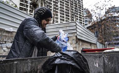 Scavenging through trash to survive