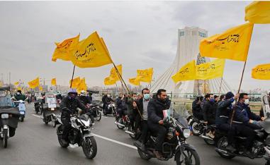 Thousands of cars and motorbikes paraded in celebration of the 43rd anniversary of Iran's 1979 Islamic Revolution in Tehran