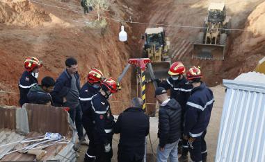 Rescue workers used five bulldozers to dig a hole parallel to the well in an attempt to reach Rayan