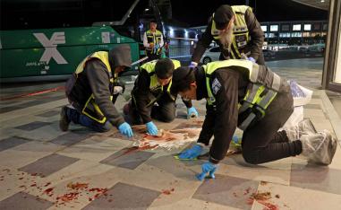 Police said the attacker careened his car into a cyclist and stabbed five people across a swath of the city center