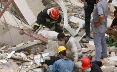 Two more bodies were pulled from the rubble 